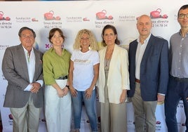 Nicole King (3l) with some of the participants at Tuesday's summit.