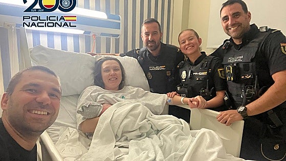 Police officers assist early morning birth on Marbella street