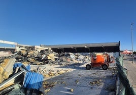 Demolition work on a warehouse to make way for the Costco petrol station.