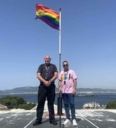 Police Constable Jason Russell and Raygan Martinez-Gaivizo at the flag raidsing ceremony.