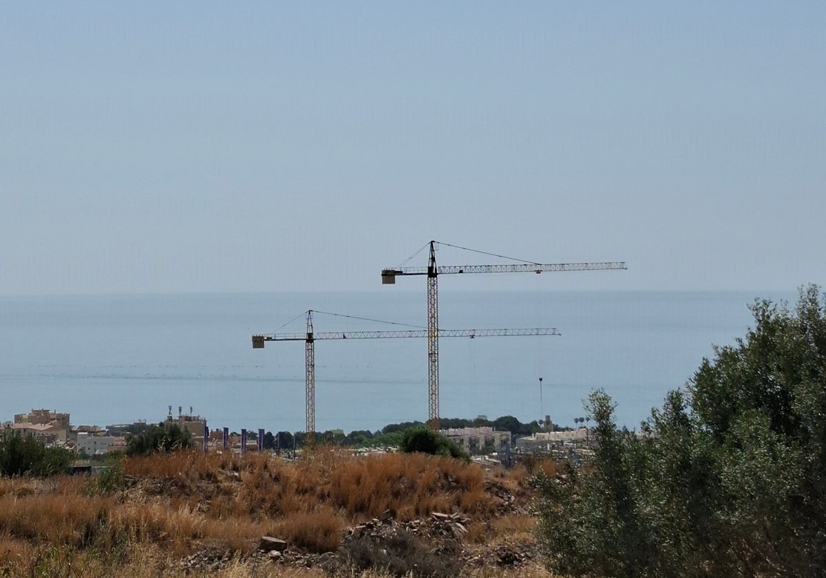 Construction cranes in Torremolinos.