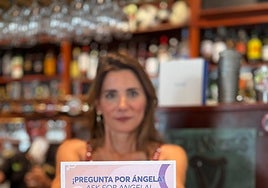 Mayor Ana Mata with one of the campaign posters.