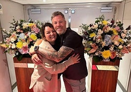 Debra and Chris Wright in an image posted by the football club on social media.