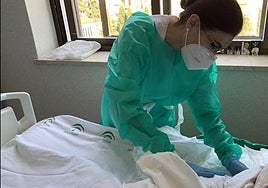 A nurse attends to a patient in a SAS hospital.