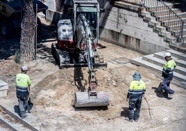 People working outdoors.