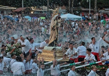 La Virgen del Carmen is escorted to the sea during last year's festivities on El Palo beach in Malaga.