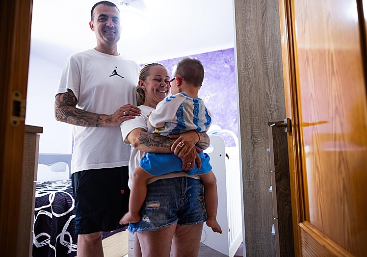 Another photo of the little boy with his family.