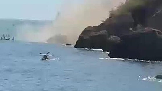 This was the moment a dramatic landslide near popular Costa del Sol waterfall left hundreds of beachgoers in shock