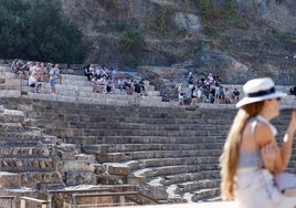 Tourists at the Roman theatre in Malaga.