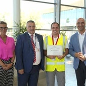 Francis Avellano with airport management (left) and minister Santos (right).