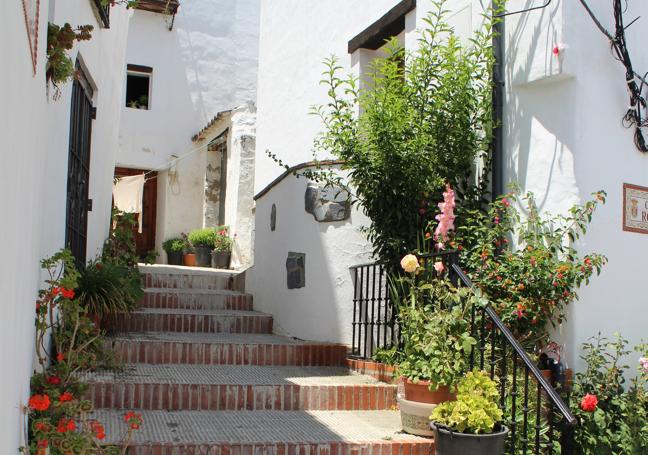Streets like this one, in Benarrabá, are part of the trail.