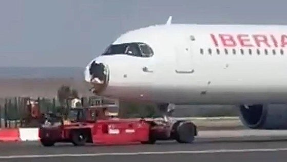 Severely damaged Iberia plane makes emergency landing at Madrid-Barajas Airport after bird strike