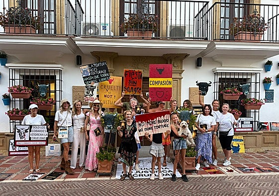 Protesters in Marbella voice their opinions about the bullfight.