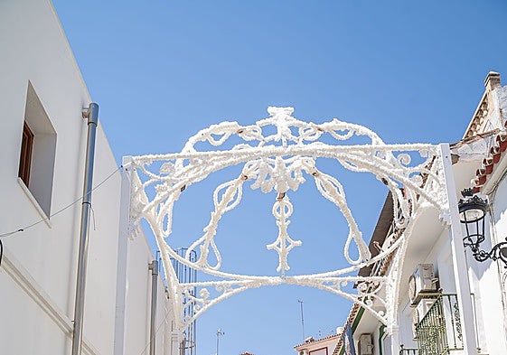 The town's patron will pass under the new structure during the procession.