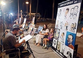 Daniel Segarra, in the foreground, with José Ramón Sosa, working this summer in La Cala de Mijas.