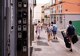 A building entrance with numerous keyboxes to holiday apartments in Malaga.