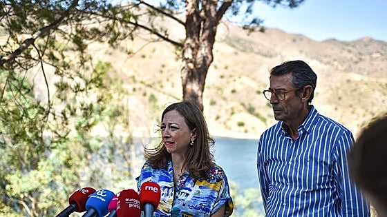 After a hot dry summer, what state are Malaga province's reservoirs in?