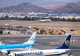 Saudia flight lands at Malaga Airport, while others from KLM and Ryanair are on the ground.