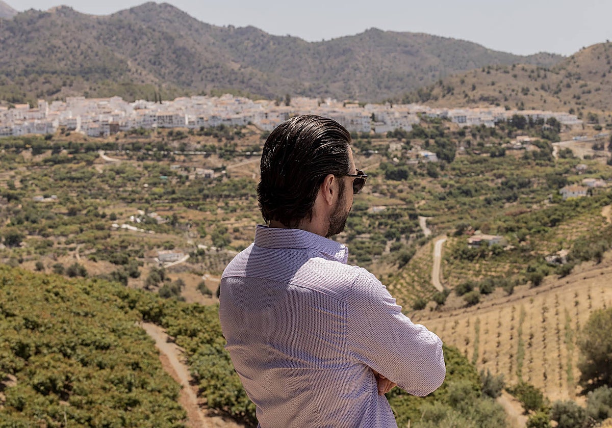 Actor Álvaro Morte contemplates the village in Malaga province where the storyline for Two Graves is set.