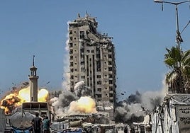 Israeli bombing of a residential building in Gaza City.
