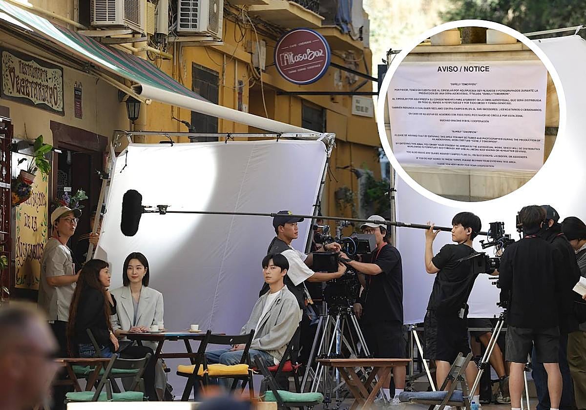 Won Ji-An and Park Seo-Joon in Malaga's Calle Alcazabilla during filming; inset - the warning hung in Parque de la Alameda in Marbella to discourage the public from entering.