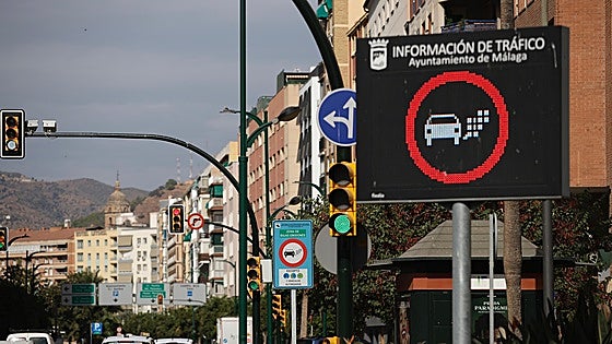 When will Malaga start issuing fines for polluting vehicles entering the city's low emission zone?
