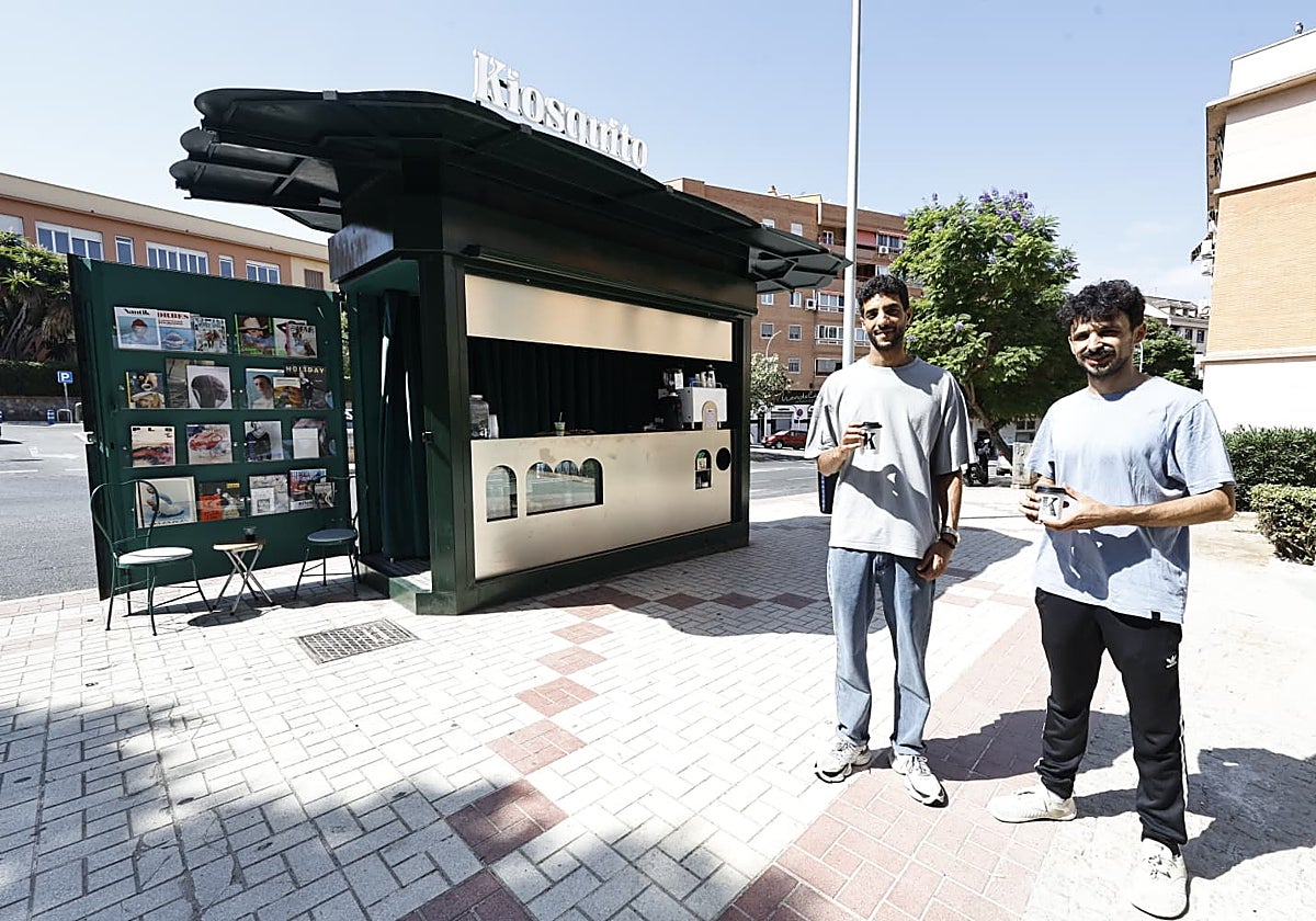The young entrepreneurs in front of the renovated kiosk.