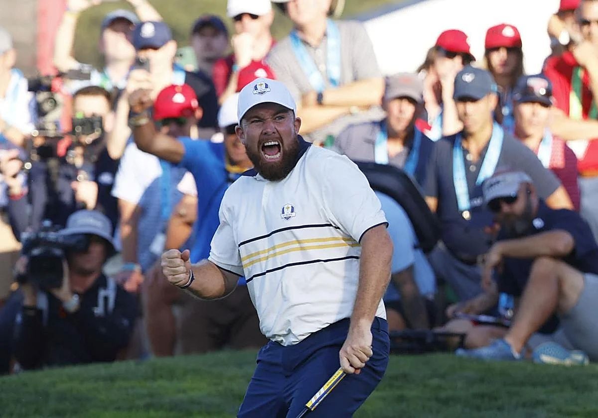 Shane Lowry celebrates the win that gifted Europe the Ryder Cup.