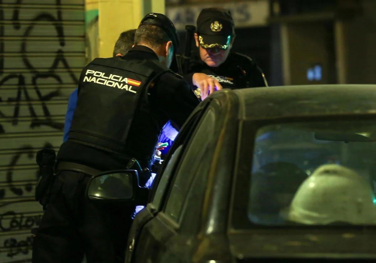 Homeless man is stabbed to death with umbrella after squabble in rain in Valencia