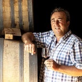 Friedrich Schatz with one of his wines.