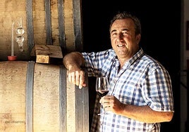 Friedrich Schatz with one of his wines.