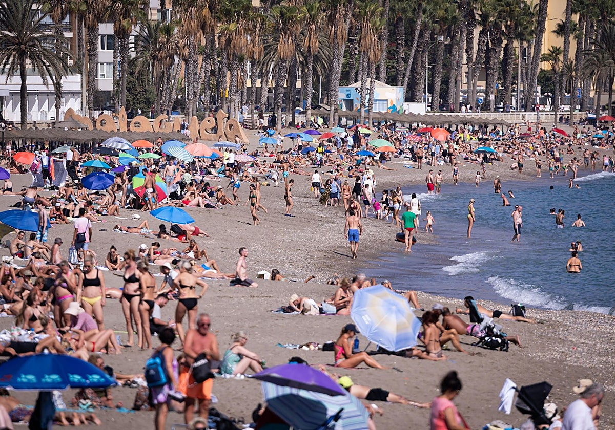 La Malagueta beach full of bathers during Monday's bank holiday.