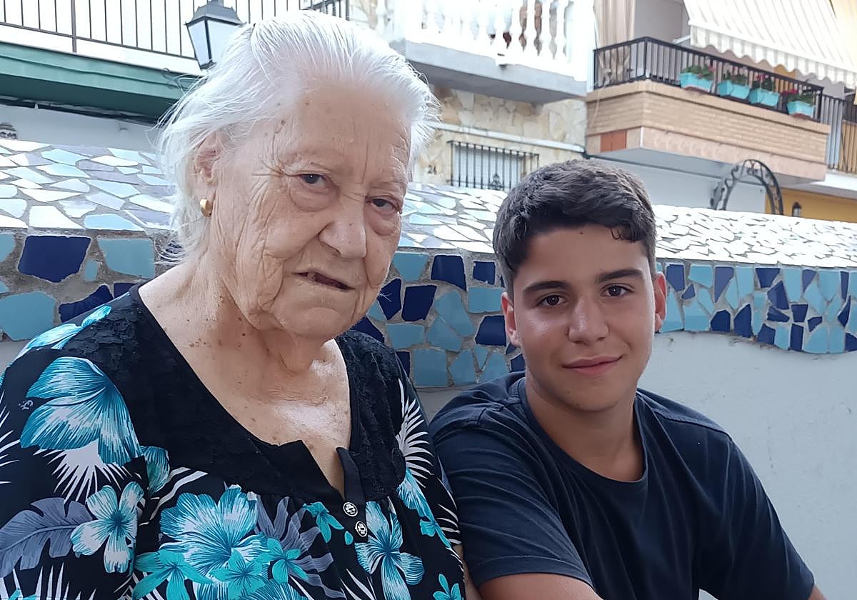 Miguel Ángel with his grandmother Lola.