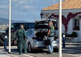 Guardia Civil officers at the crime scene.