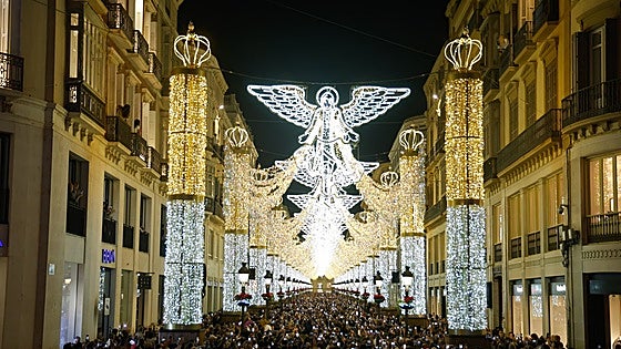 When will Malaga's famous Christmas light and sound show be switched on this year?