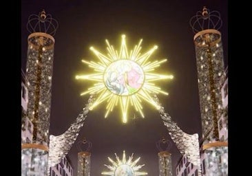 What are the dates and show times for the magical Christmas light and sound show in Malaga's Calle Larios