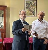 Minister John Cortes with the author Manolo Galliano.