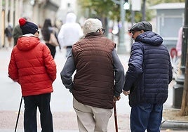 Three pensioners out for a walk.