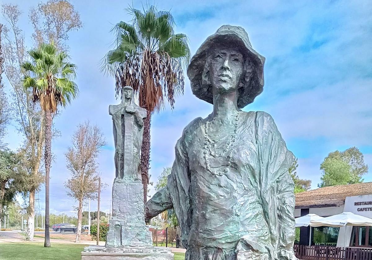 The bronze sculpture of Miss Whitney holding her work.