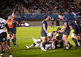 Malaga's Alberto Carmona, right, on home soil.