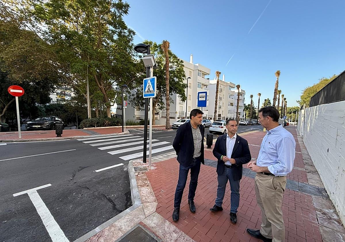 The mayor (centre) inspects the work after completion.