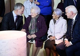 King Felipe VI and German president Frank-Walter Steinmeier with survivors of the bombing.