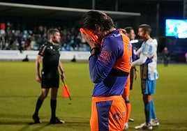 Malaga's Eneko Jauregi at the final whistle.