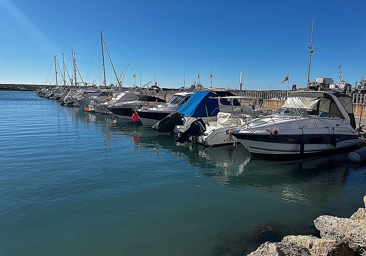 Boats moored at Caleta de Vélez harbour