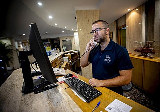 File photo of an employee receiving calls at the Hotel Salobreña.