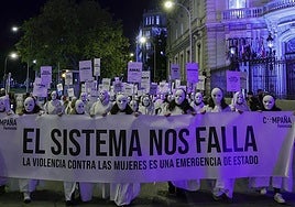 Protesters wearing blank face masks on 25 November, International Day for the Elimination of Violence against Women