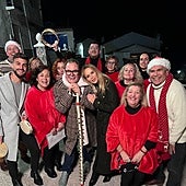 Alan Carr and Amanda Holden with locals in Moclín during the filming of the Christmas special.