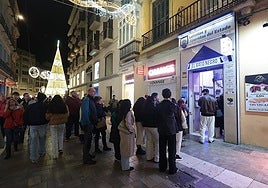 How much have people in Malaga and along the Costa del Sol spent on average trying their luck in Spain's huge Christmas lottery draw?