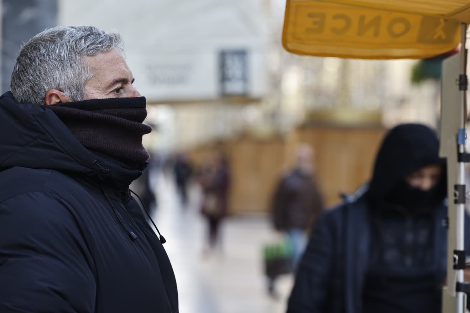 Coats and scarves are the trend today in Malaga city.