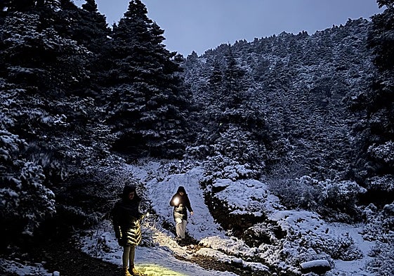 Hikers in Sierra de las Nieves after last weekend's snowfall.